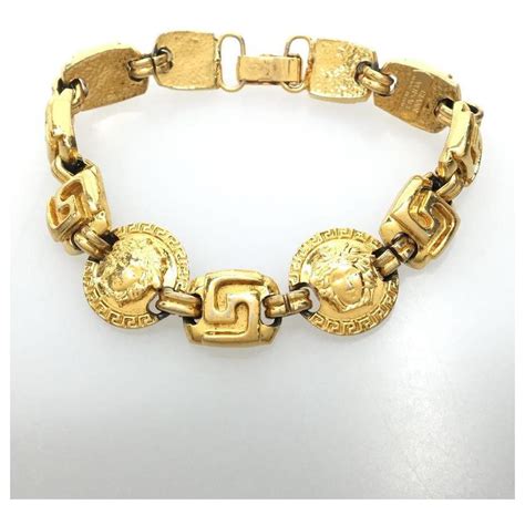 versace gold lariat bracelet|gianni Versace bracelet.